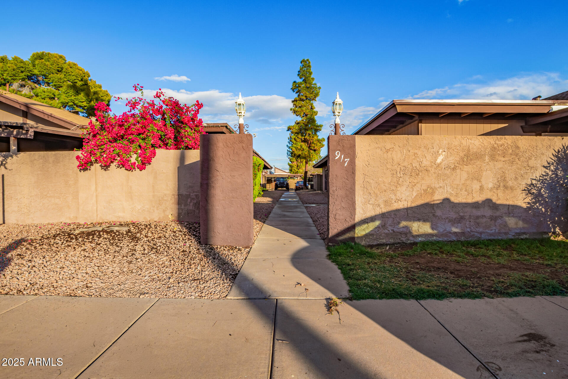 917 South Acapulco Lane, Unit C Tempe, AZ 85288 - Photo 21 of 21 a front view of a house with a yard