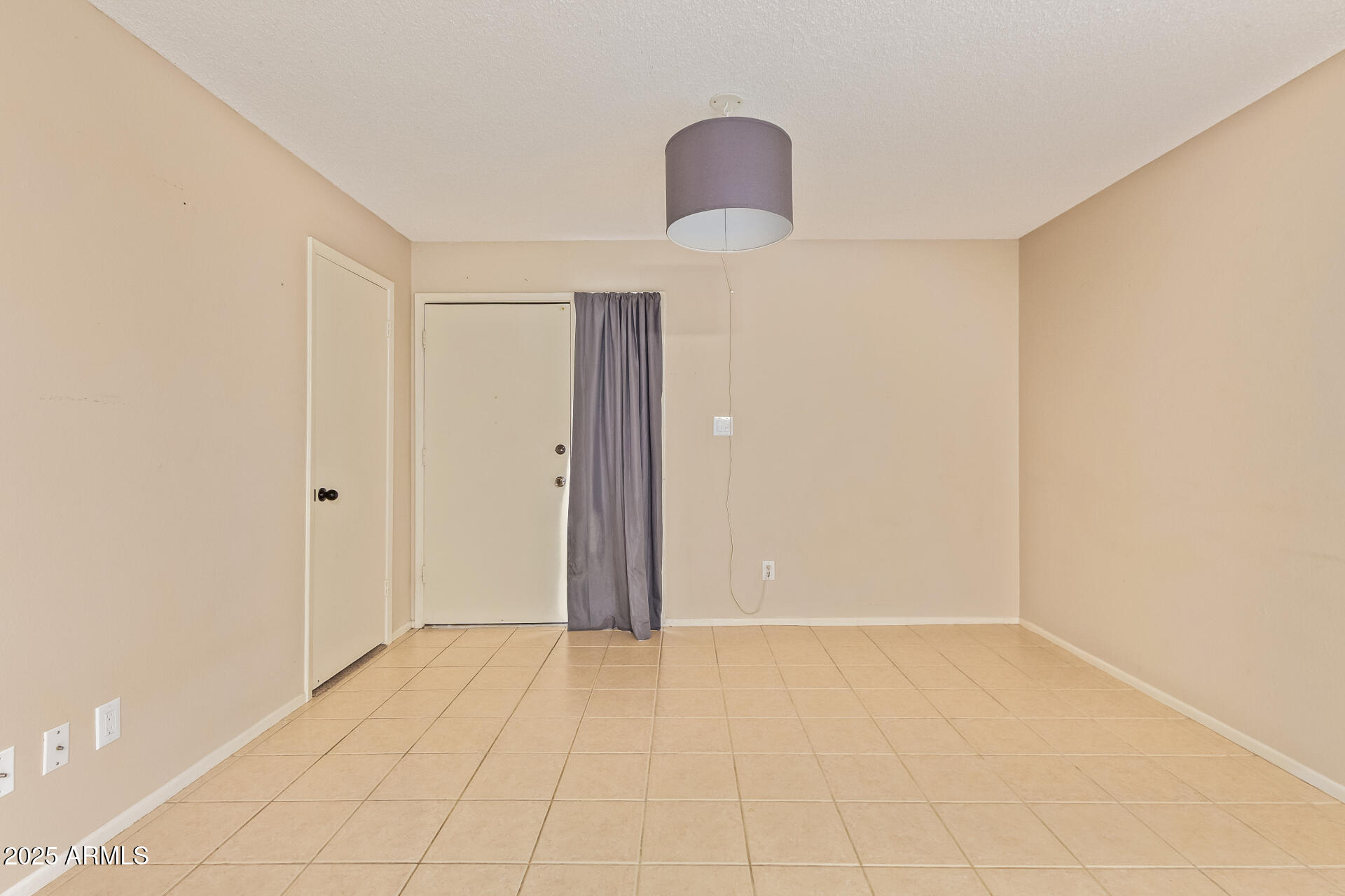 917 South Acapulco Lane, Unit C Tempe, AZ 85288 - Photo 9 of 21 a view of an empty room