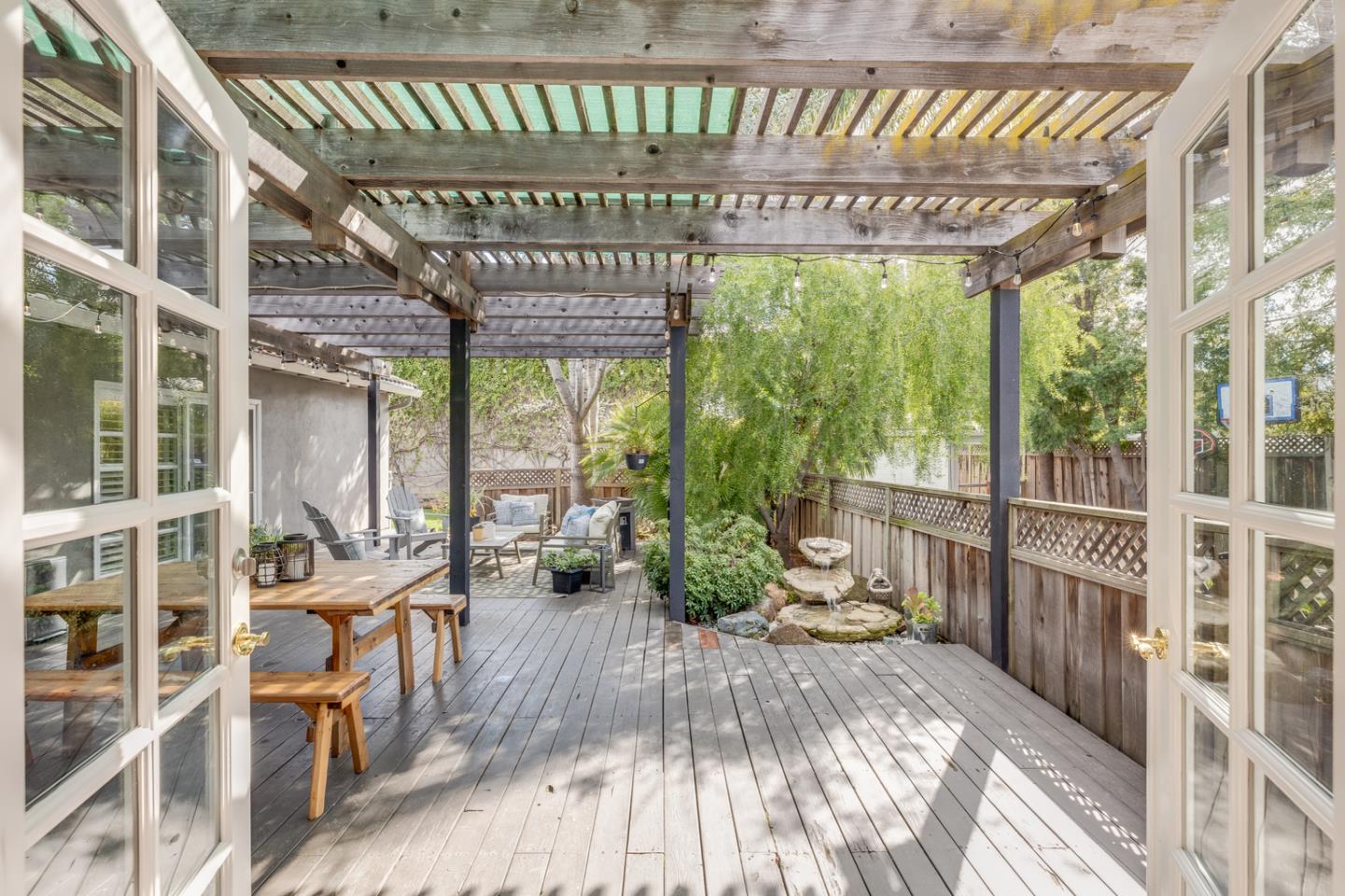 1570 Walnut Drive Campbell, CA 95008 - Photo 16 of 68 a view of a porch with chairs and backyard