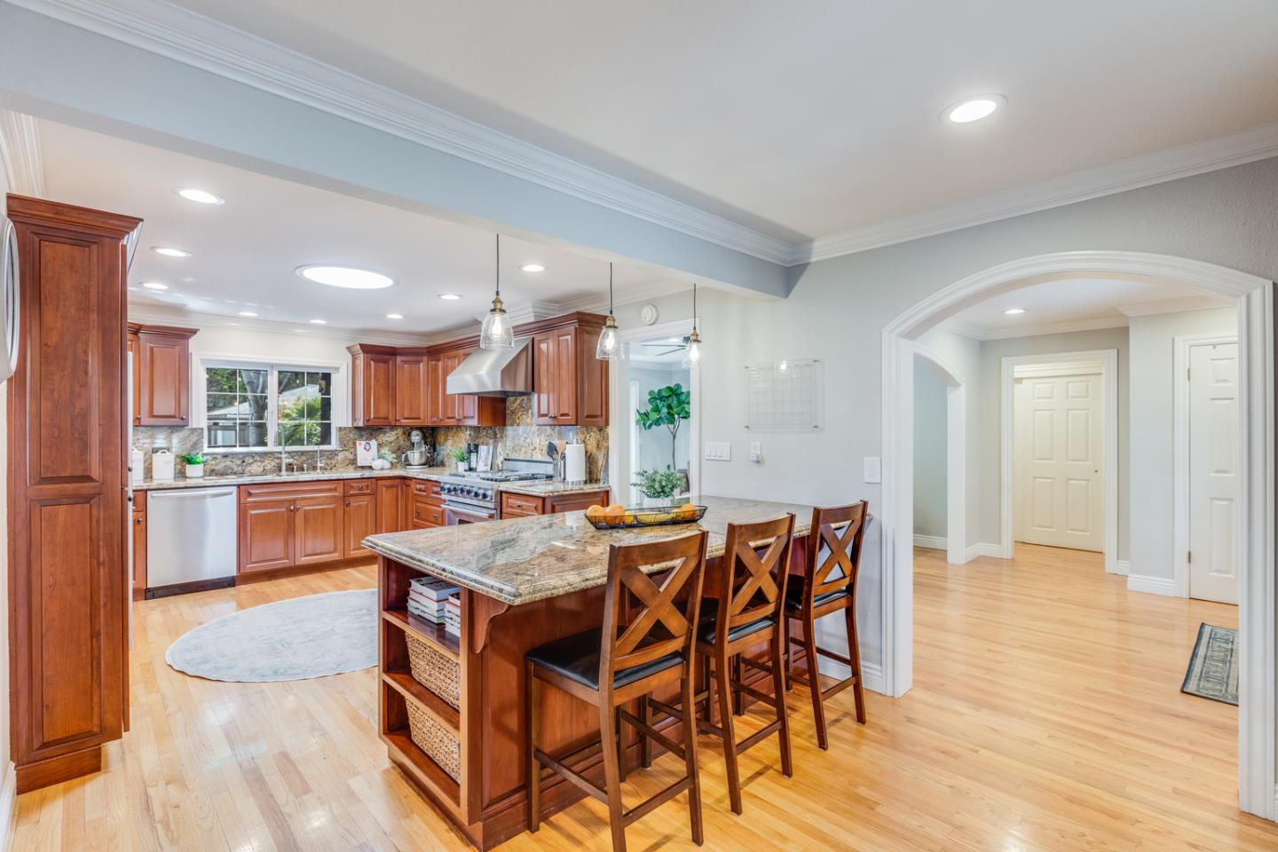 1570 Walnut Drive Campbell, CA 95008 - Photo 21 of 68 a dining hall with stainless steel appliances kitchen island granite countertop a dining table and chairs