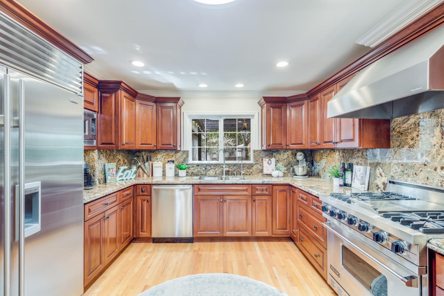 1570 Walnut Drive Campbell, CA 95008 - Photo 24 of 68 a kitchen with stainless steel appliances granite countertop wooden cabinets a sink and a stove
