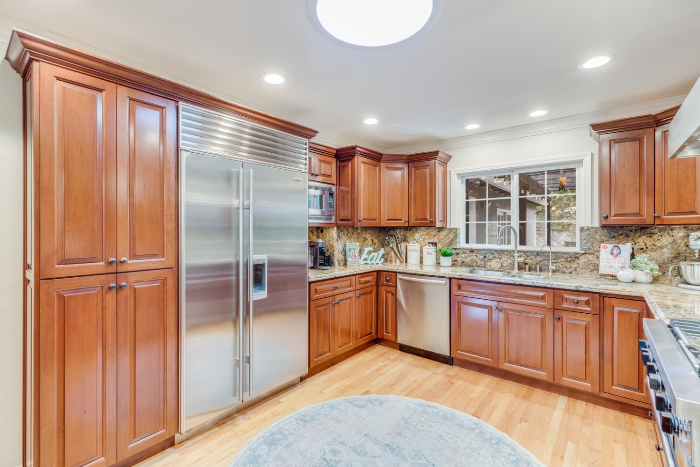 1570 Walnut Drive Campbell, CA 95008 - Photo 26 of 68 a kitchen with granite countertop stainless steel appliances a sink and counter space