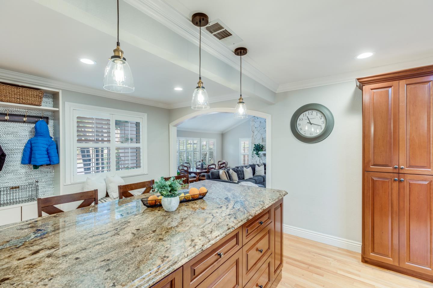 1570 Walnut Drive Campbell, CA 95008 - Photo 27 of 68 a view of a kitchen with granite countertop a oven a stove a dining table and chairs