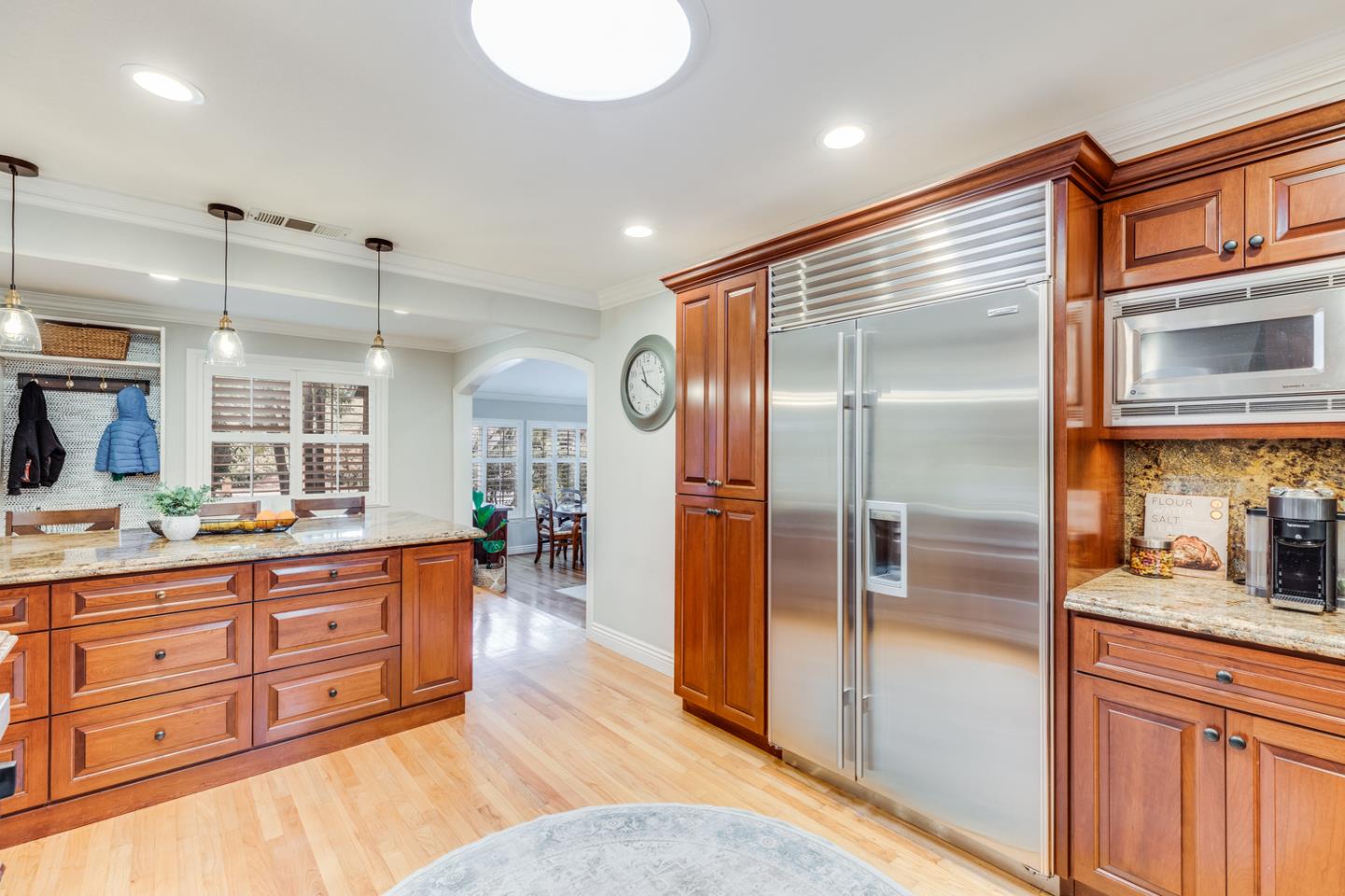 1570 Walnut Drive Campbell, CA 95008 - Photo 30 of 68 a open kitchen with stainless steel appliances granite countertop a refrigerator and wooden cabinets