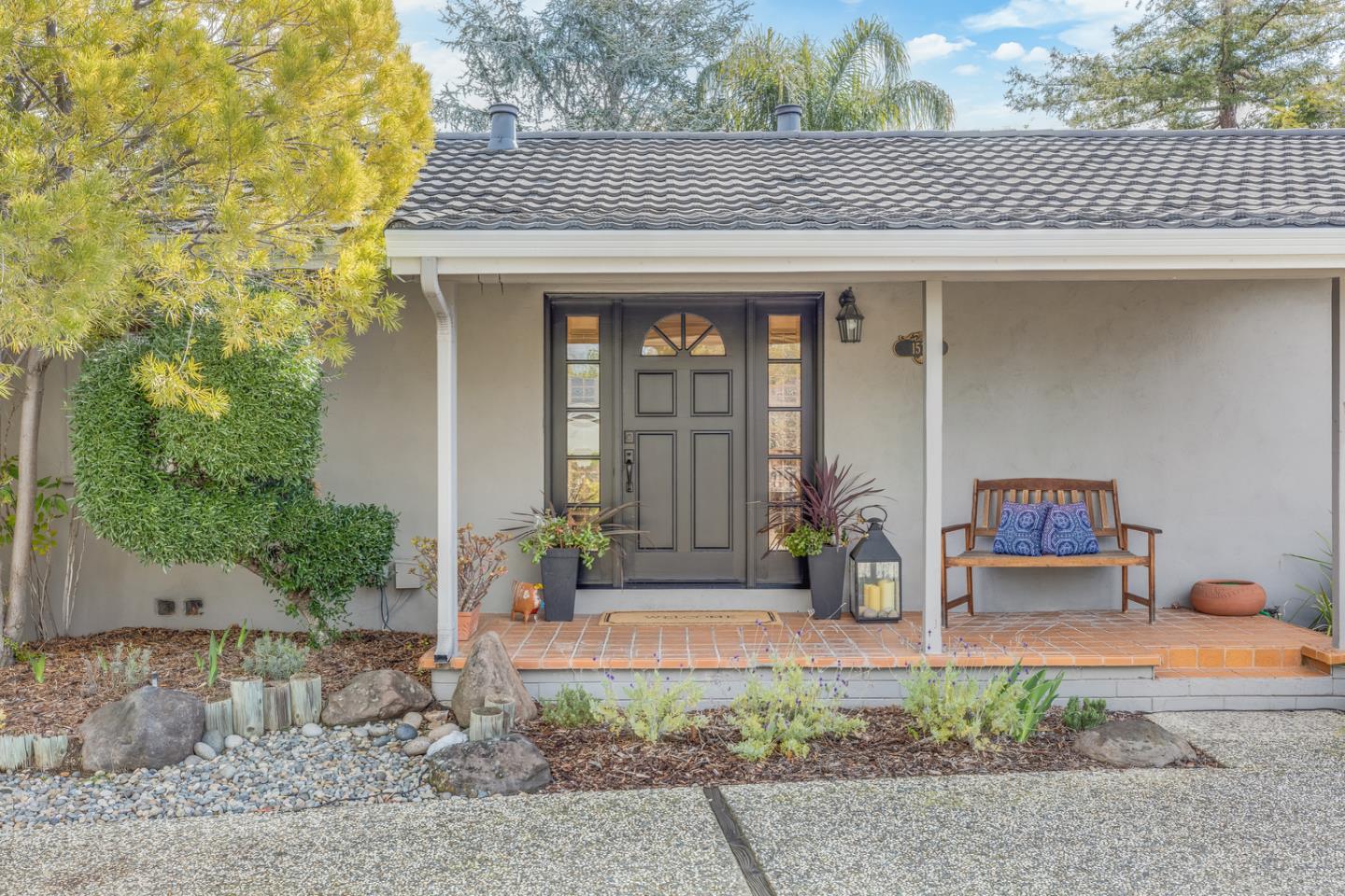 1570 Walnut Drive Campbell, CA 95008 - Photo 7 of 68 a front view of a house with garden