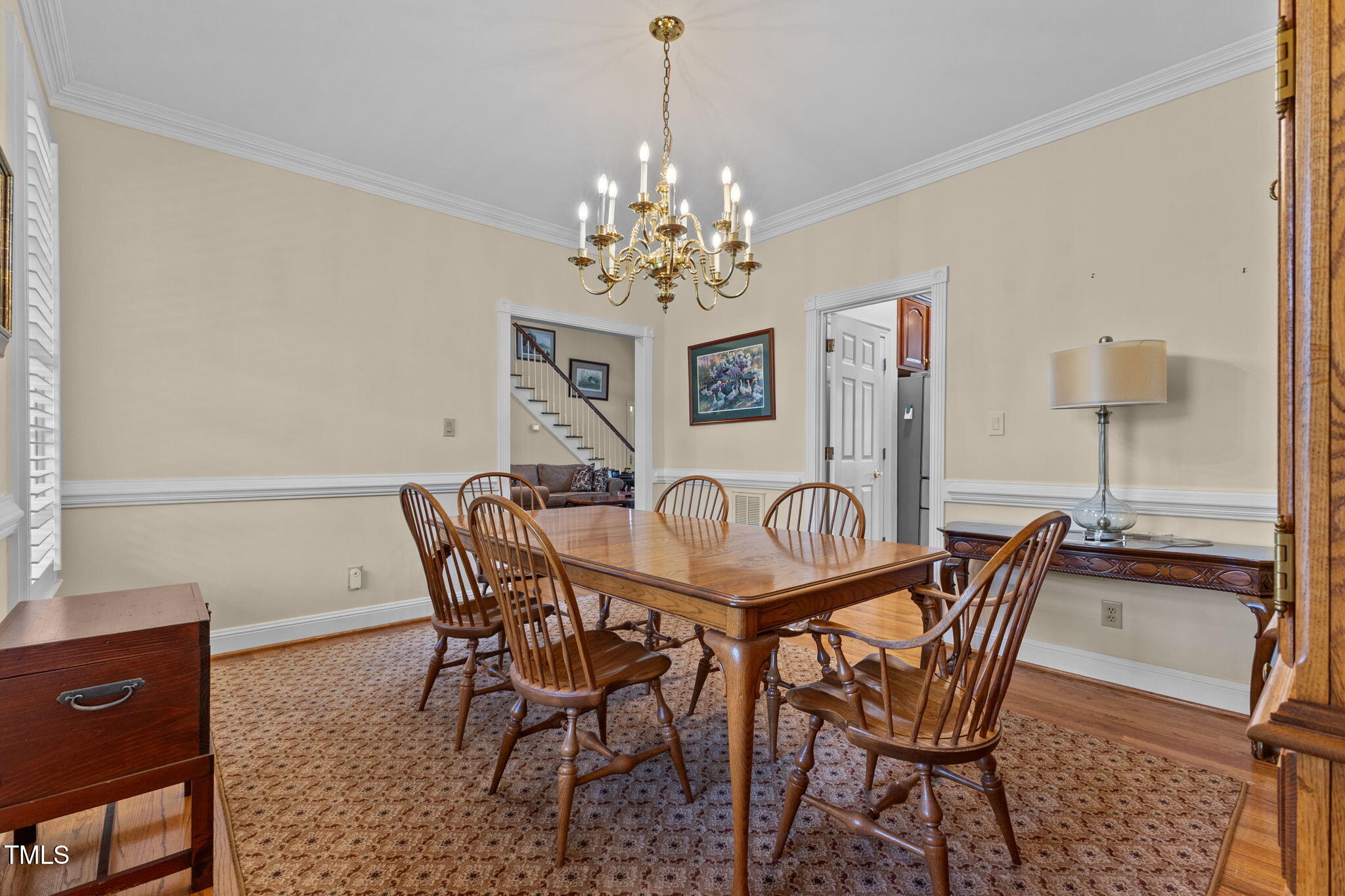 5405 Carbonton Road Sanford, NC 27330 - Photo 13 of 63 a view of a dining room with furniture and chandelier