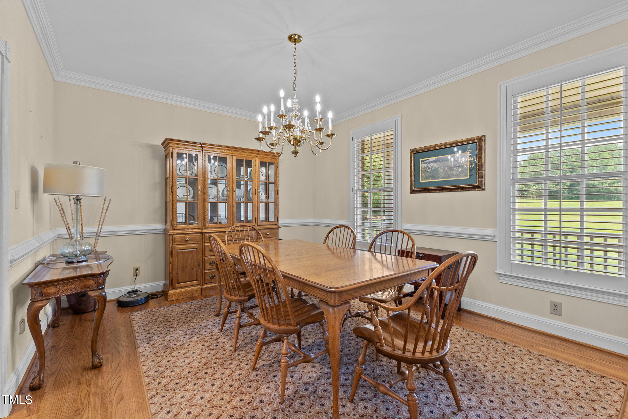 5405 Carbonton Road Sanford, NC 27330 - Photo 14 of 63 a dining room with furniture a chandelier and window