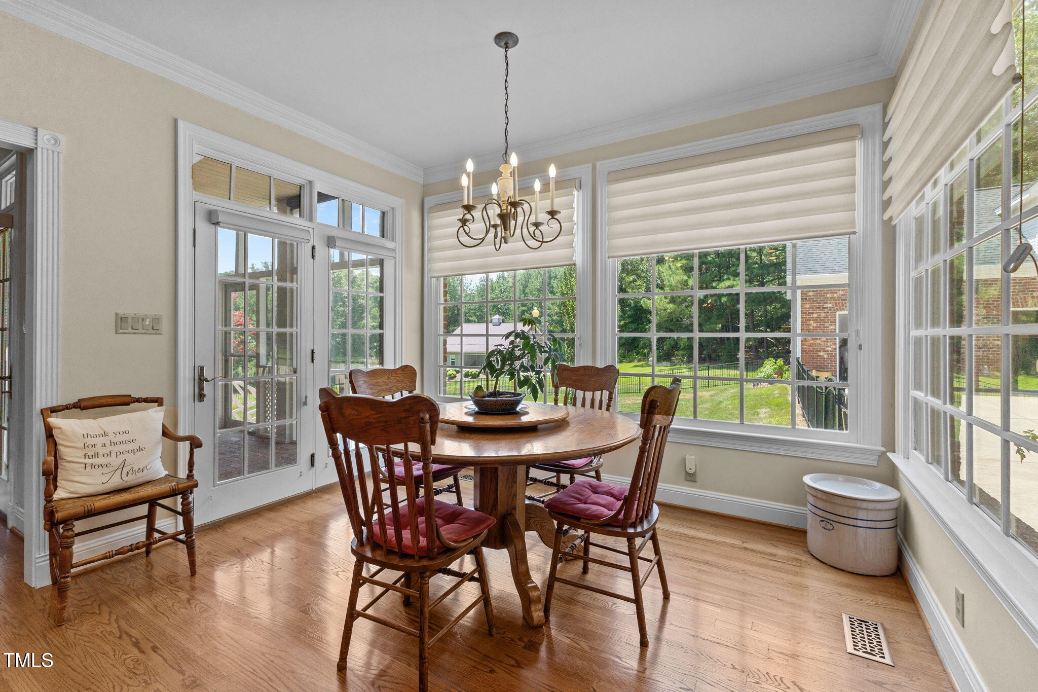 5405 Carbonton Road Sanford, NC 27330 - Photo 15 of 63 a view of a dining room with furniture window and wooden floor