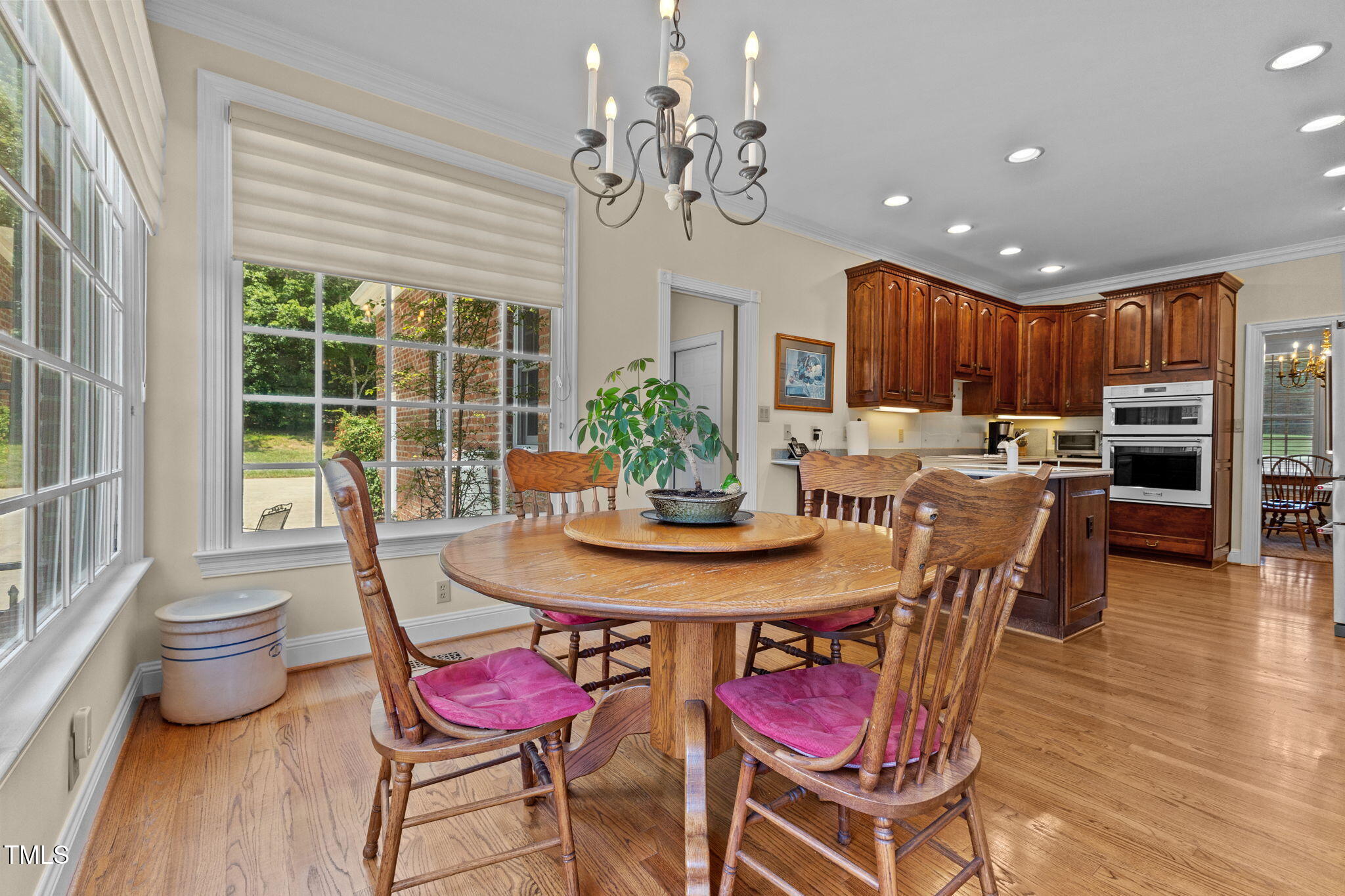 5405 Carbonton Road Sanford, NC 27330 - Photo 16 of 63 a view of a dining room with furniture window and wooden floor