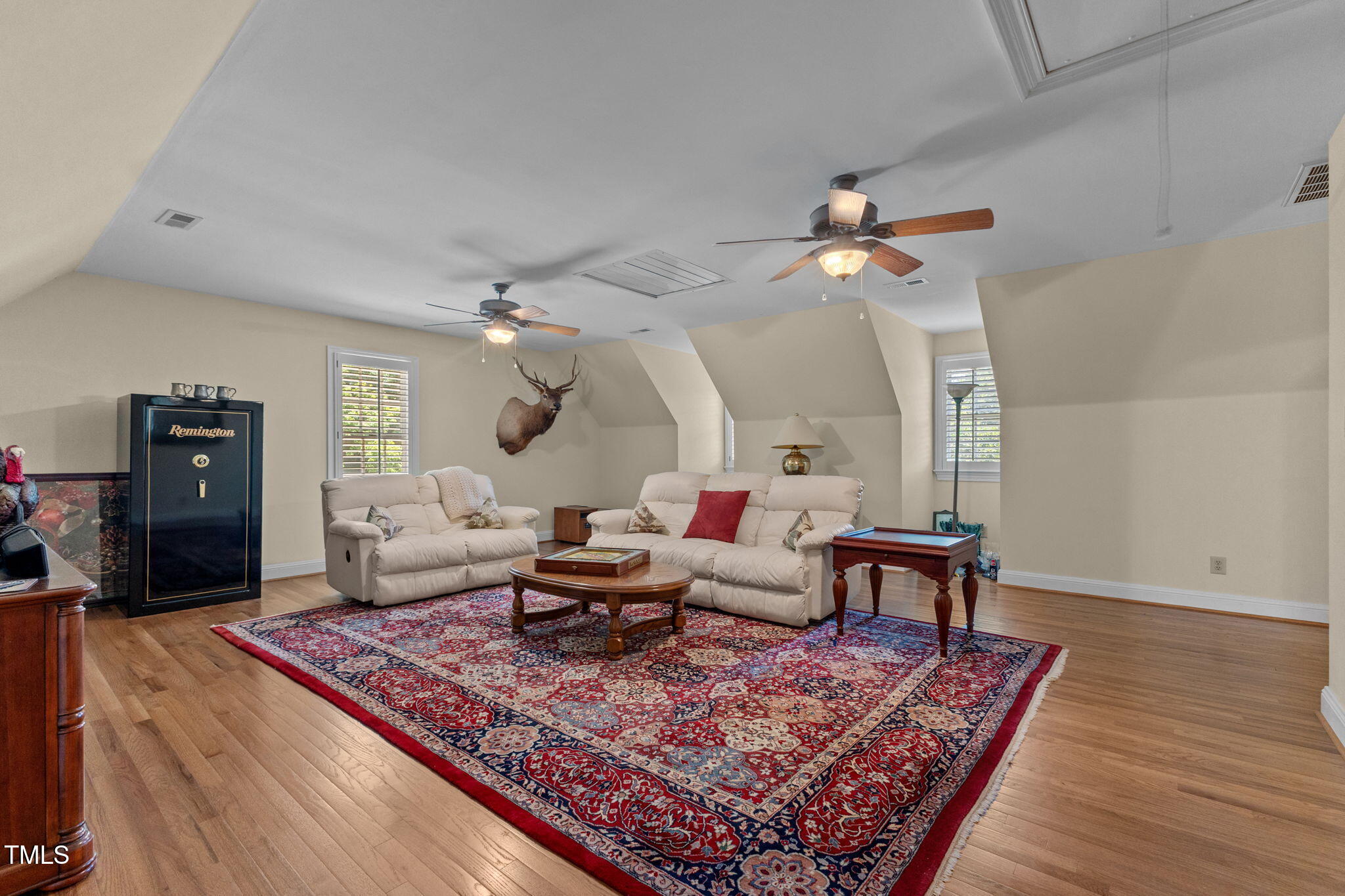 5405 Carbonton Road Sanford, NC 27330 - Photo 23 of 63 a living room with furniture and a rug