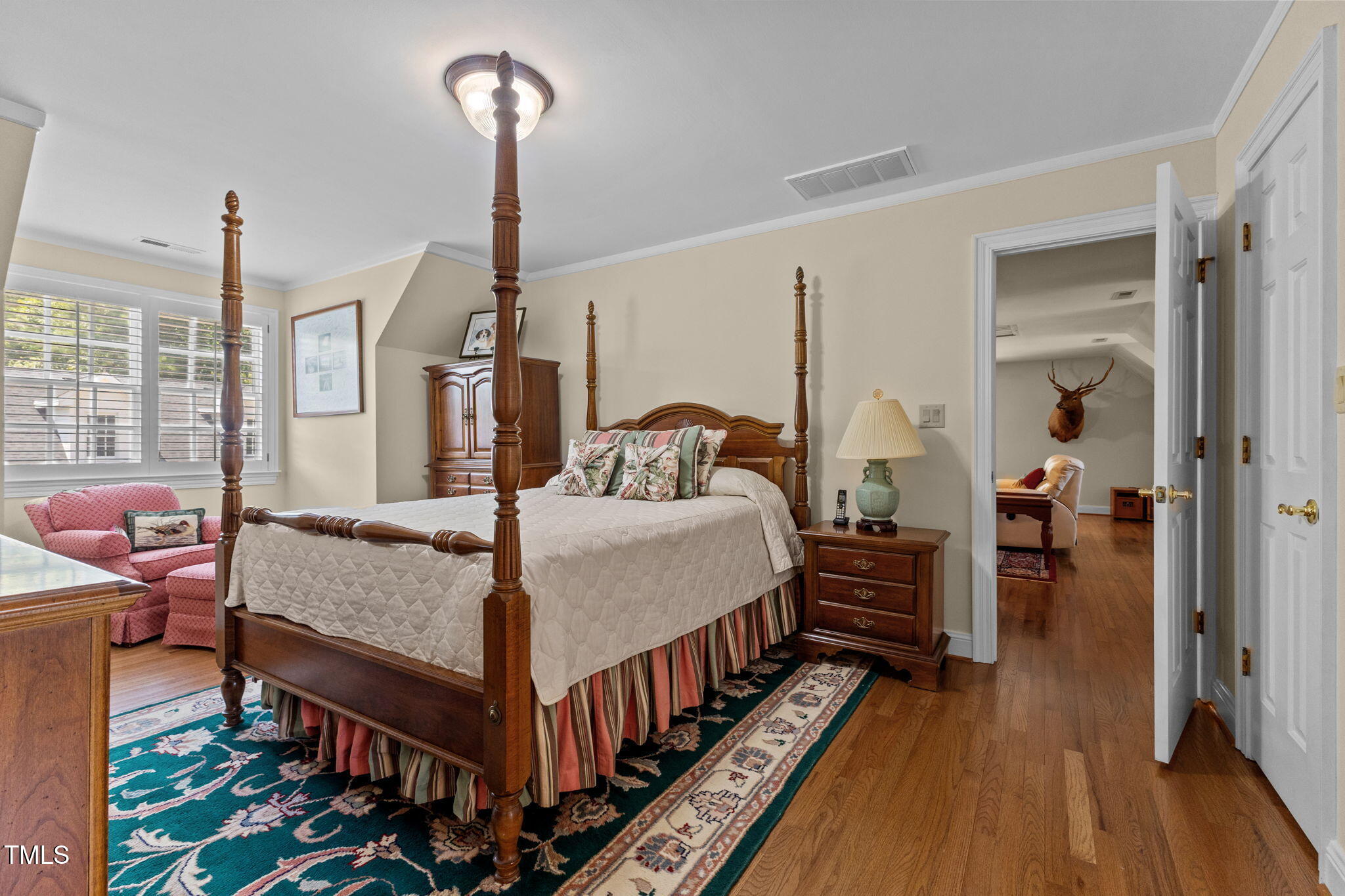 5405 Carbonton Road Sanford, NC 27330 - Photo 25 of 63 a bedroom with bed and wooden floor
