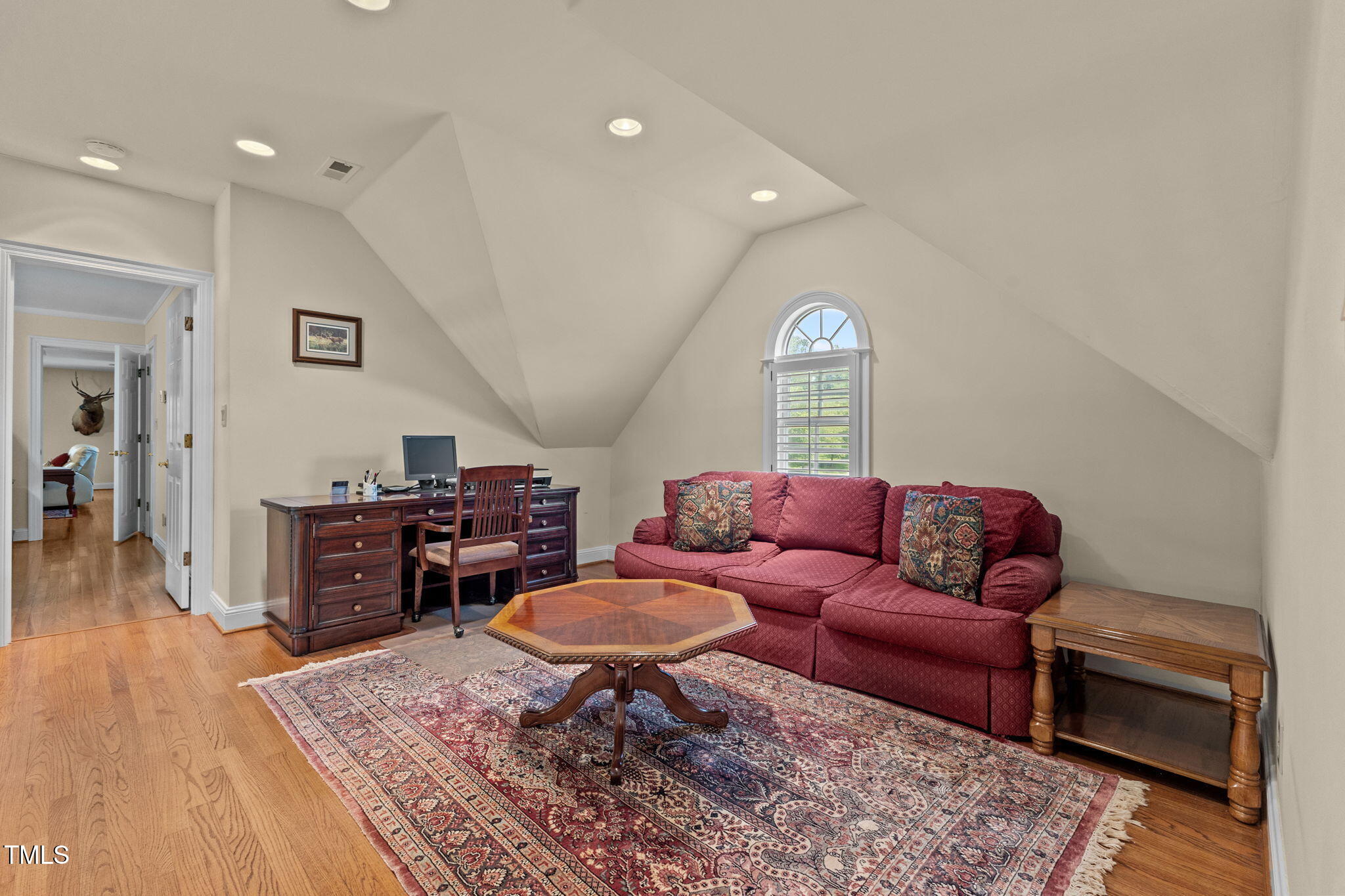 5405 Carbonton Road Sanford, NC 27330 - Photo 27 of 63 a living room with furniture and a wooden floor
