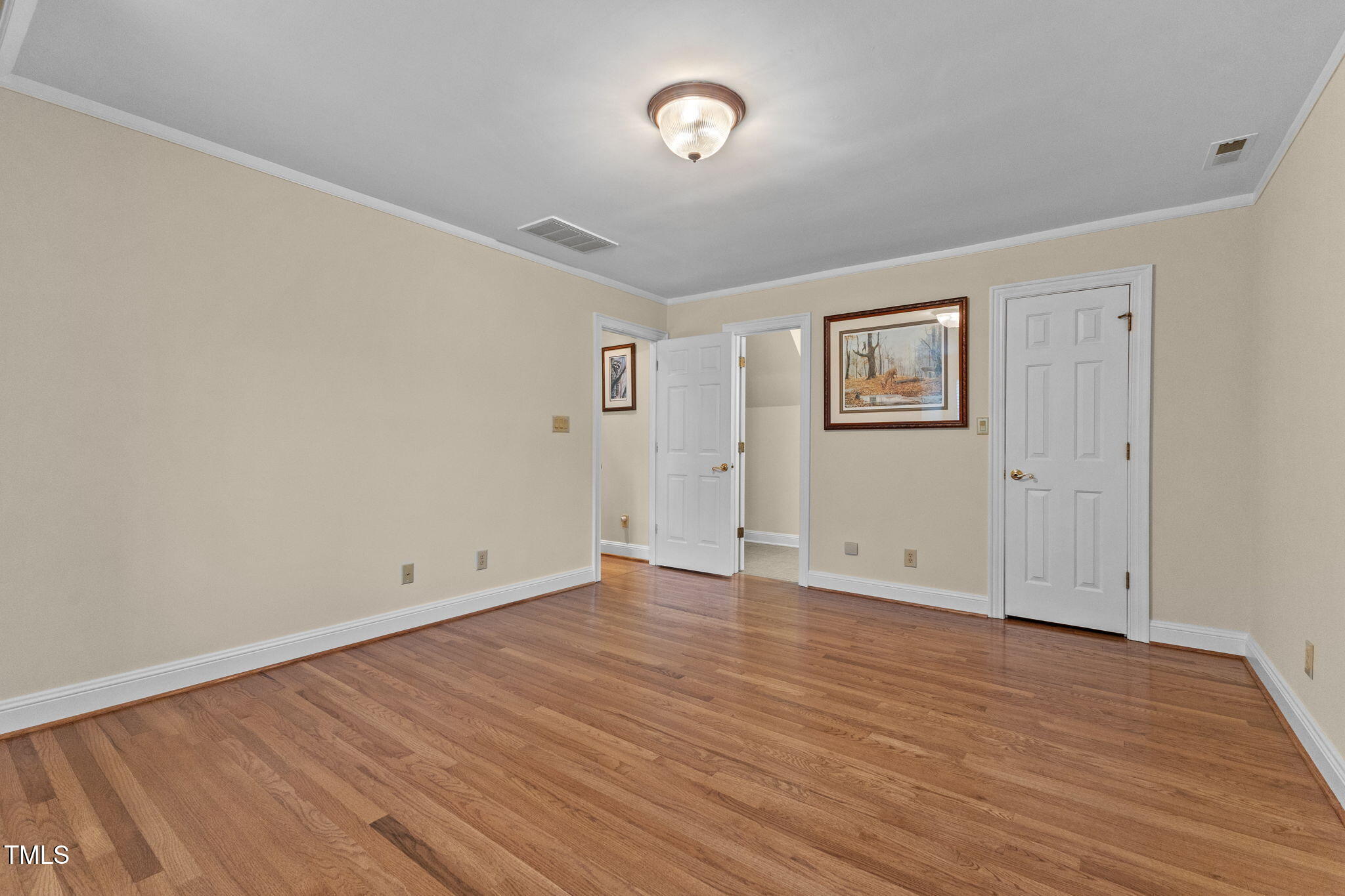 5405 Carbonton Road Sanford, NC 27330 - Photo 29 of 63 a view of an empty room with wooden floor