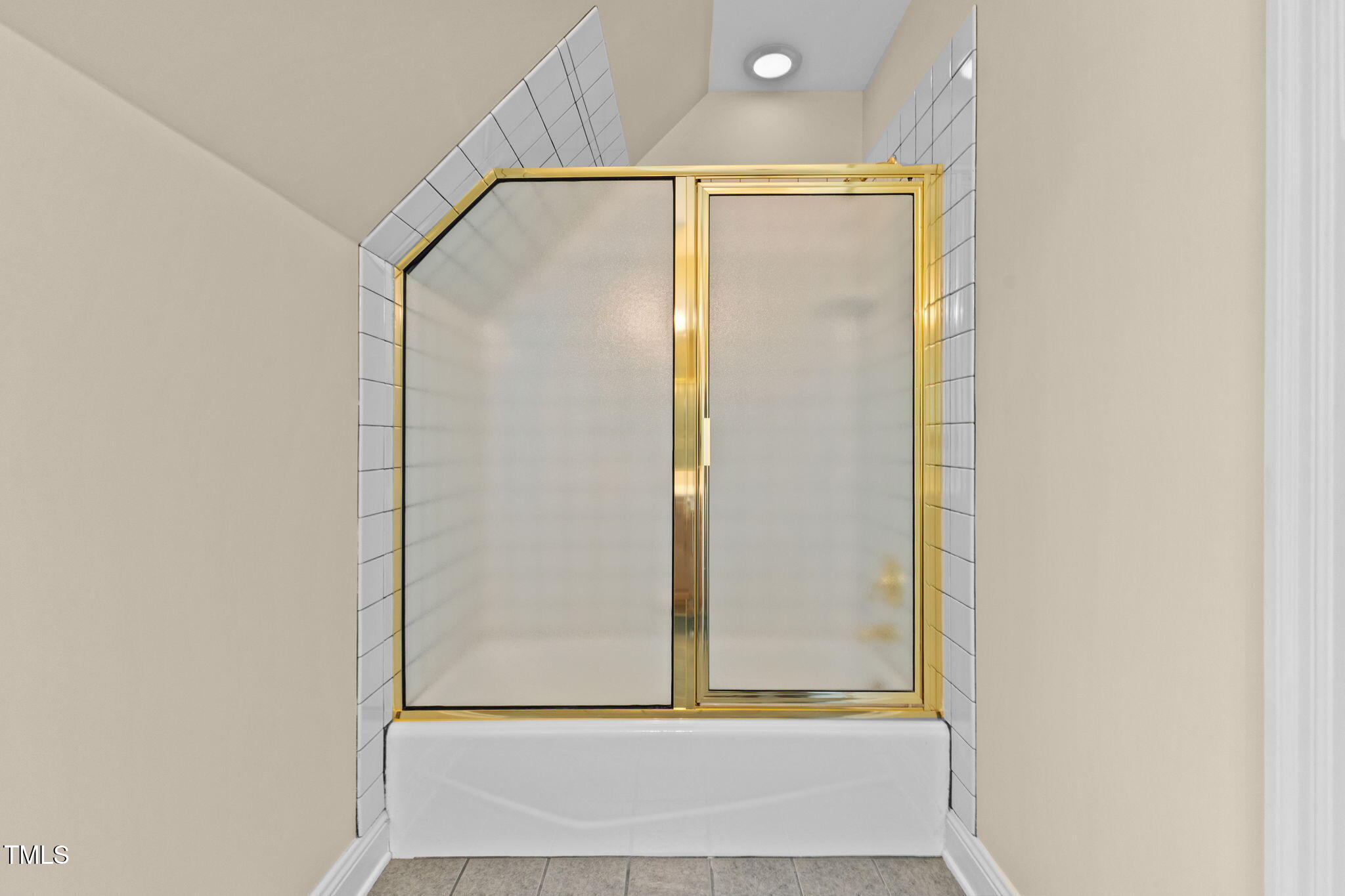 5405 Carbonton Road Sanford, NC 27330 - Photo 31 of 63 a bathroom with a glass shower door