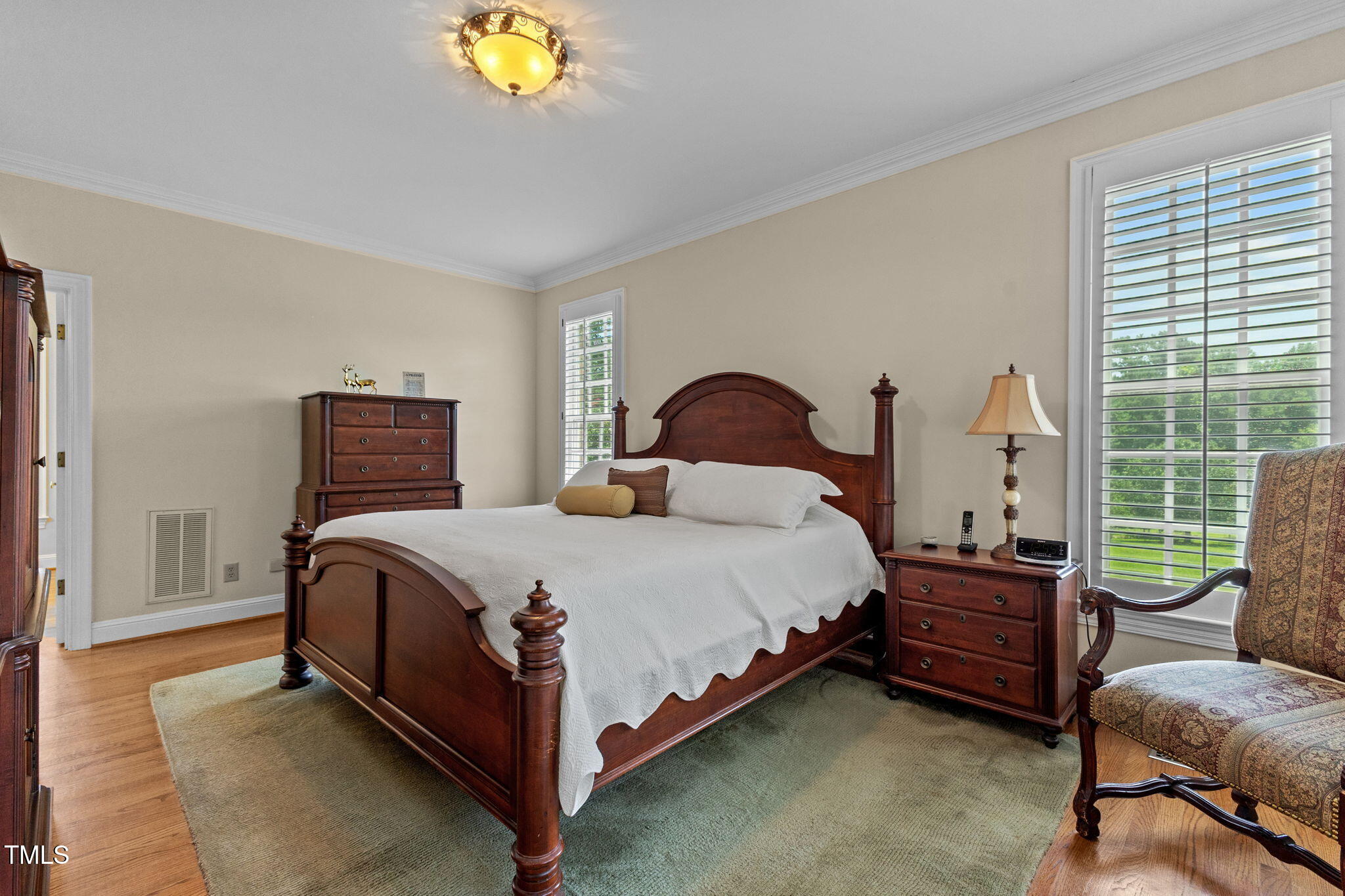 5405 Carbonton Road Sanford, NC 27330 - Photo 34 of 63 a bedroom with a bed and a window