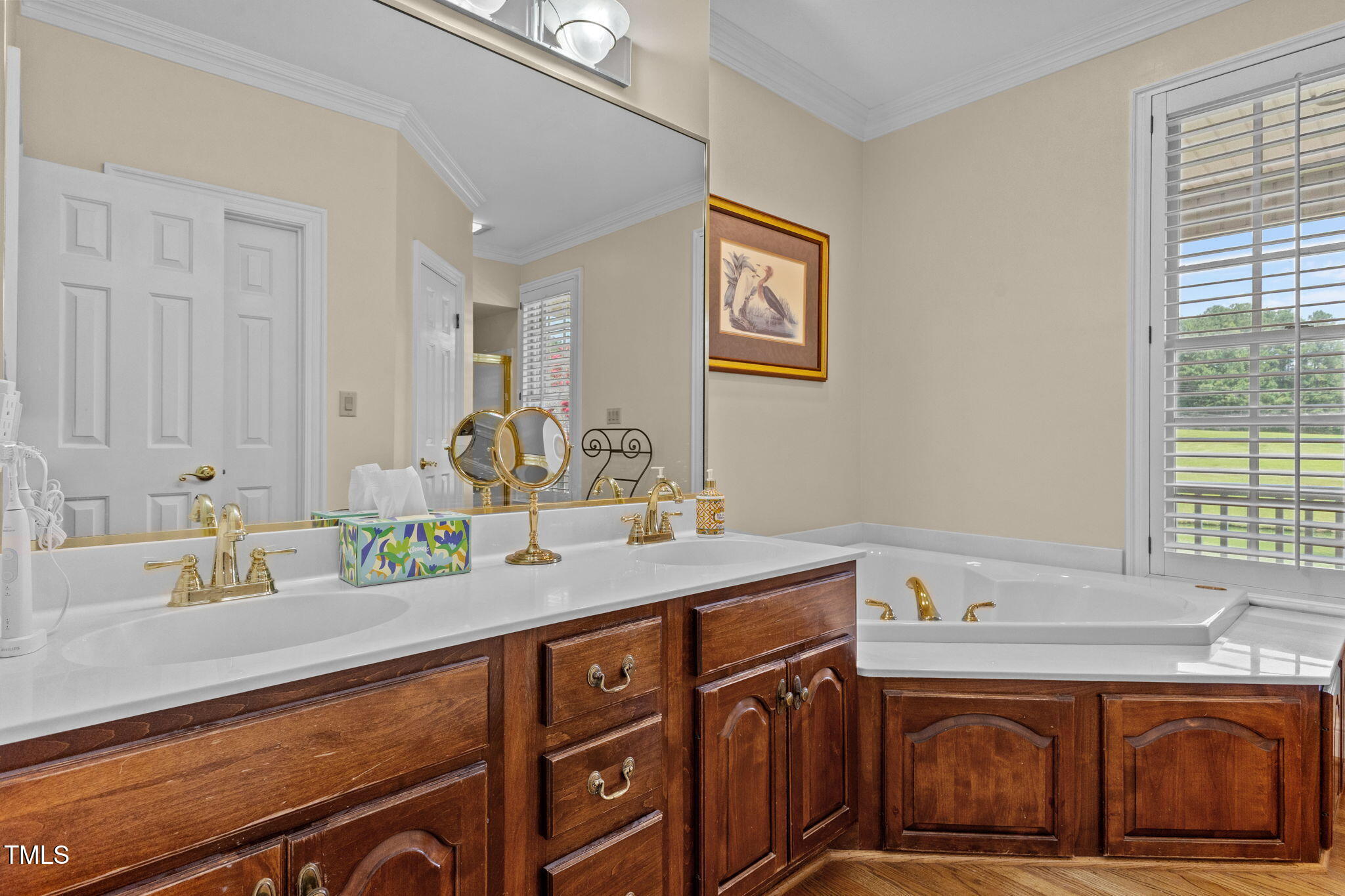 5405 Carbonton Road Sanford, NC 27330 - Photo 36 of 63 a bathroom with a sink and a mirror