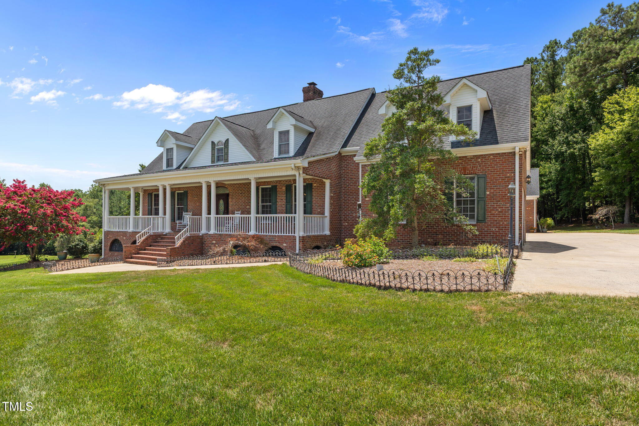 5405 Carbonton Road Sanford, NC 27330 - Photo 4 of 63 a front view of a house with a yard