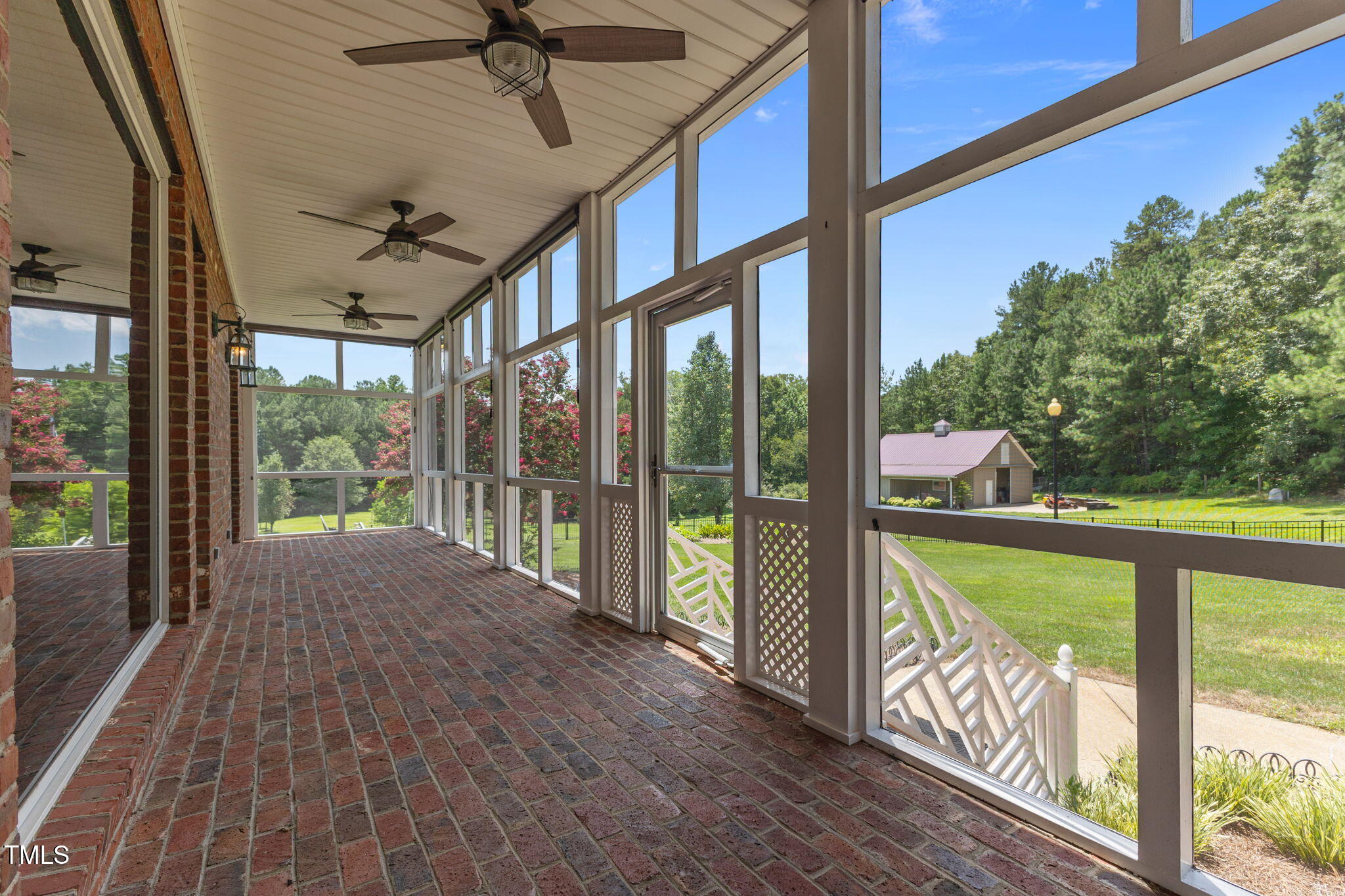 5405 Carbonton Road Sanford, NC 27330 - Photo 51 of 63 a view of a porch with wooden floor and outdoor space