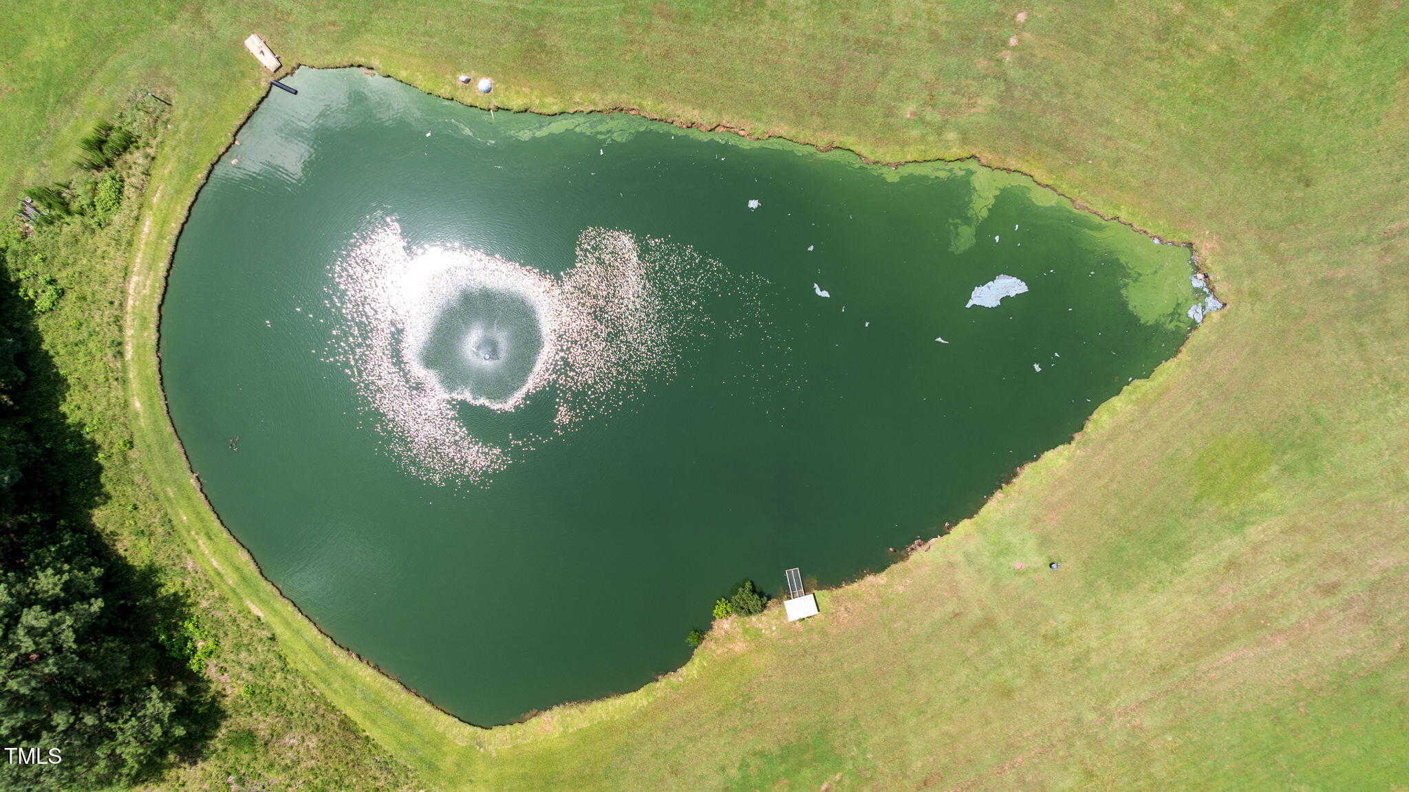 5405 Carbonton Road Sanford, NC 27330 - Photo 59 of 63 a view of a wooden floor and a swimming pool