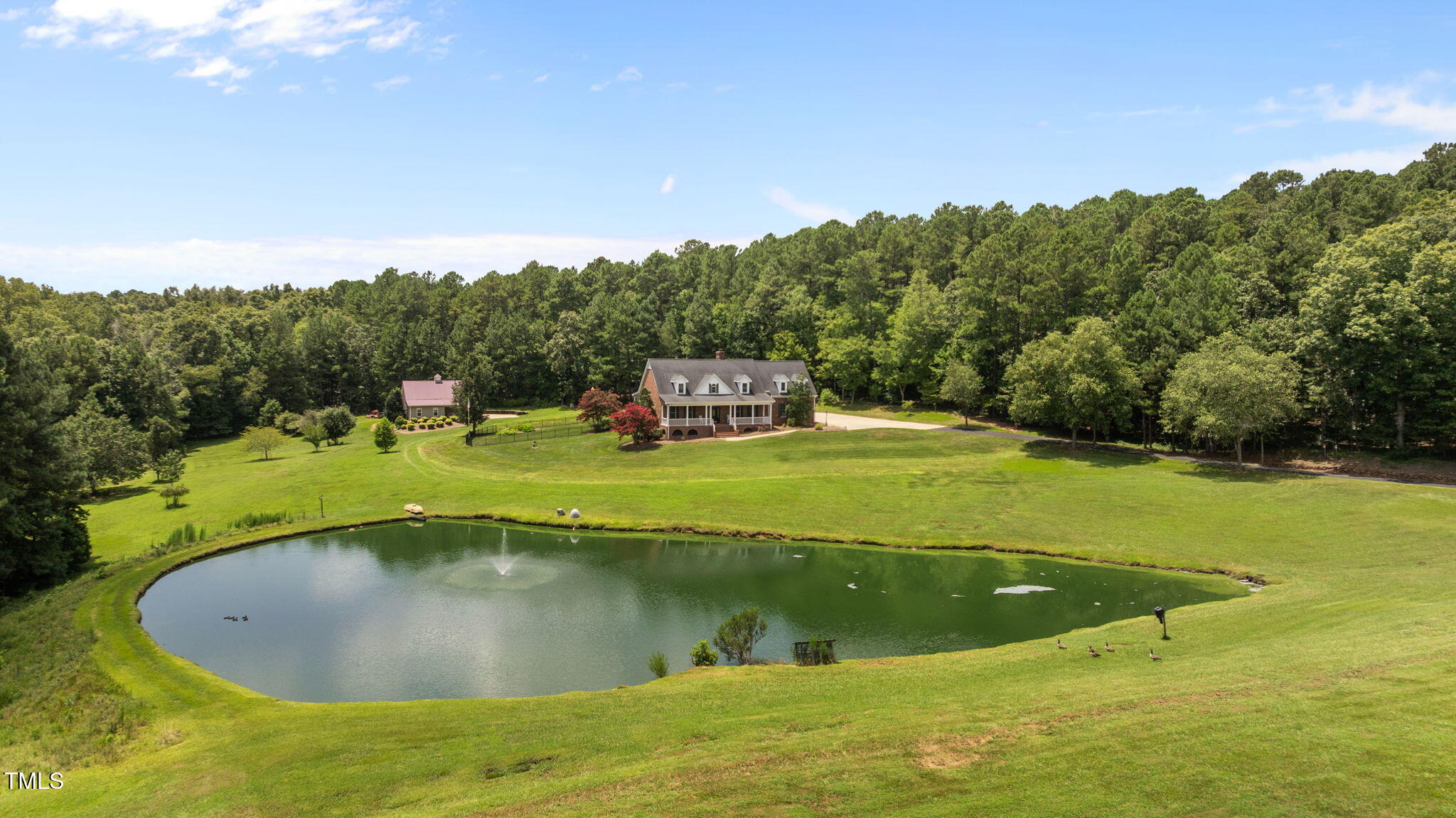 5405 Carbonton Road Sanford, NC 27330 - Photo 6 of 63 a view of a swimming pool with a yard