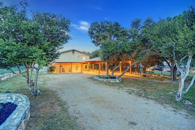 a view of a lake with a yard