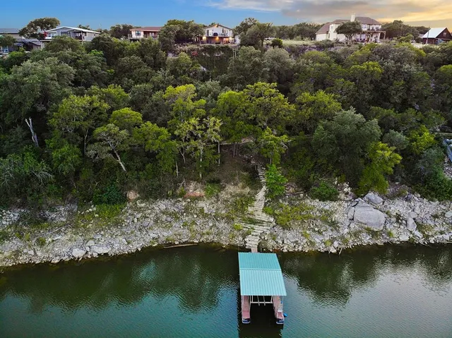 an aerial view of residential house with outdoor space