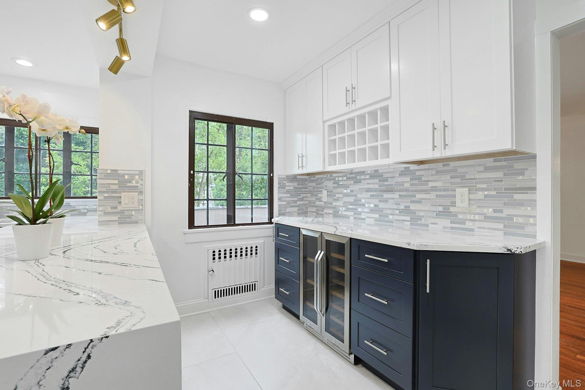 14 Withington Road Scarsdale, NY 10583 - Photo 15 of 41 a kitchen with stainless steel appliances granite countertop a sink and a granite counter tops