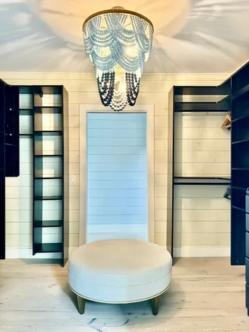 a bathroom with a tub and shower