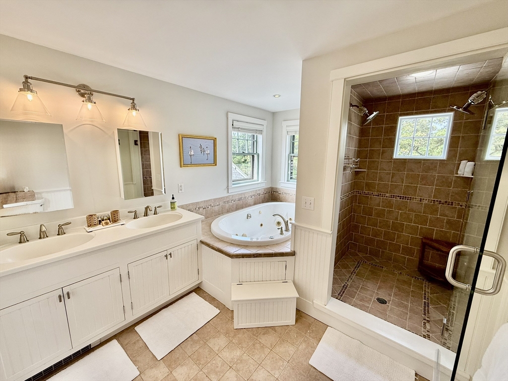 1 Pochick Avenue Nantucket, MA 02554 - Photo 23 of 42 a bathroom with a sink a toilet and shower