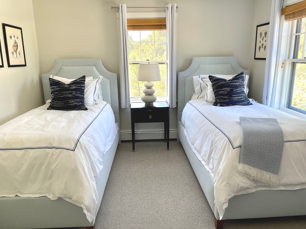 1 Pochick Avenue Nantucket, MA 02554 - Photo 25 of 42 a bedroom with a bed and a window