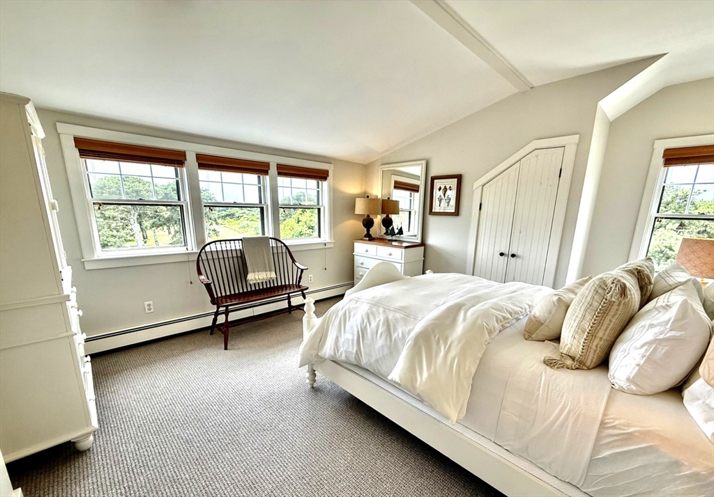 1 Pochick Avenue Nantucket, MA 02554 - Photo 27 of 42 a bedroom with a bed couch and a window