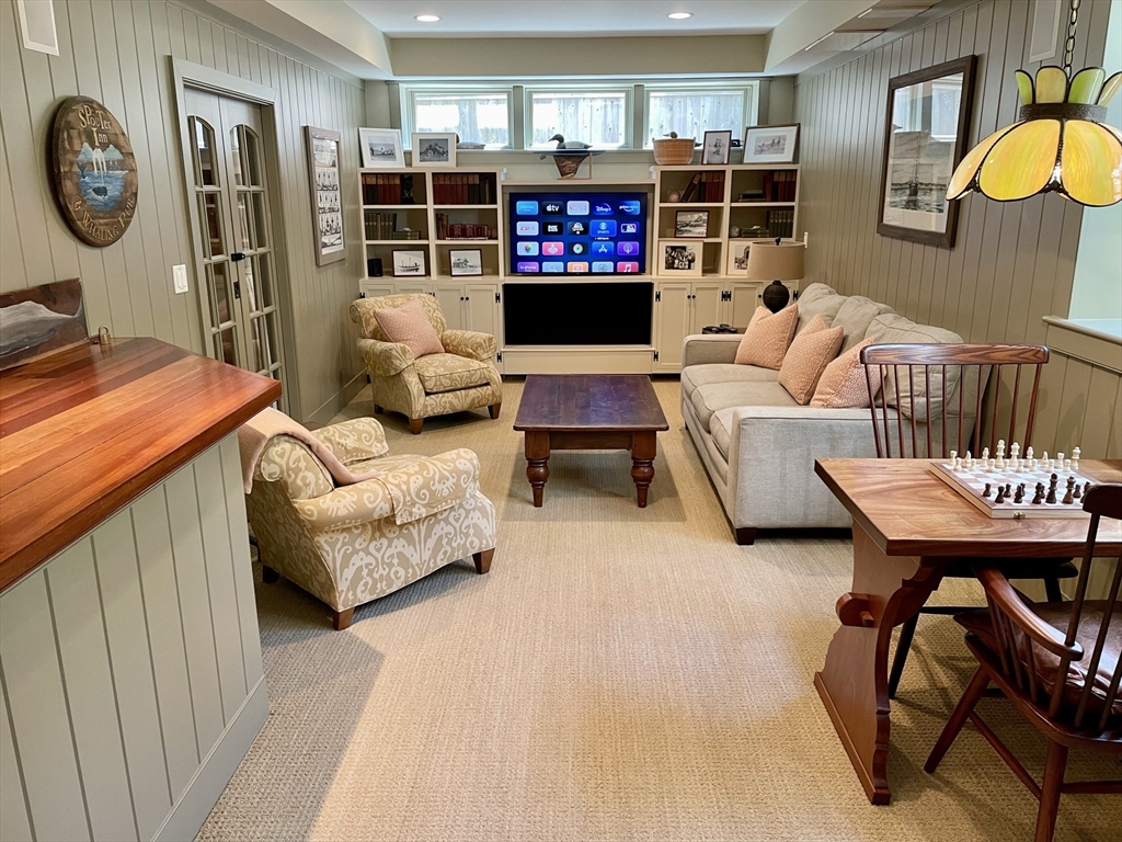 1 Pochick Avenue Nantucket, MA 02554 - Photo 33 of 42 a living room with furniture and a flat screen tv