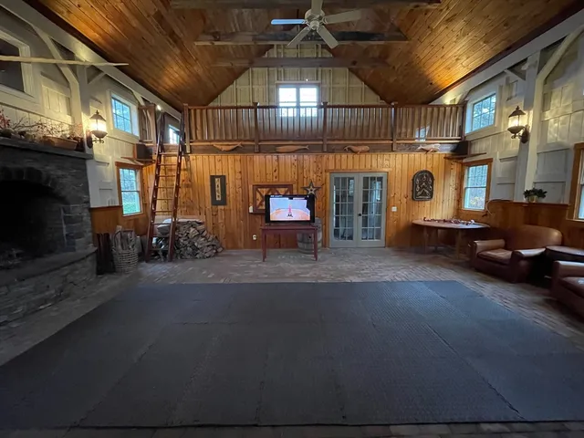 a view of a chairs and tables in the patio