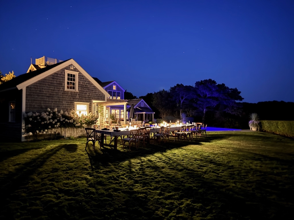 1 Pochick Avenue Nantucket, MA 02554 - Photo 7 of 42 a front view of a house with a yard