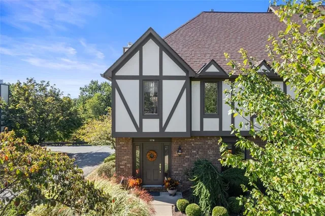 front view of a house with a small yard