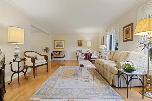 a living room with furniture and a couch