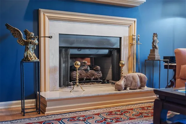 a bedroom with a bed and a mirror