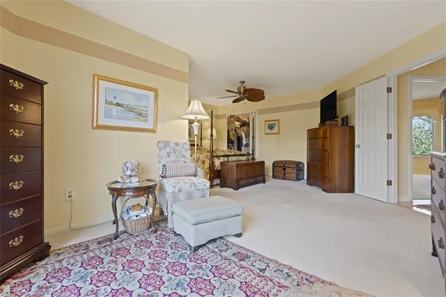 a living room with furniture and a rug