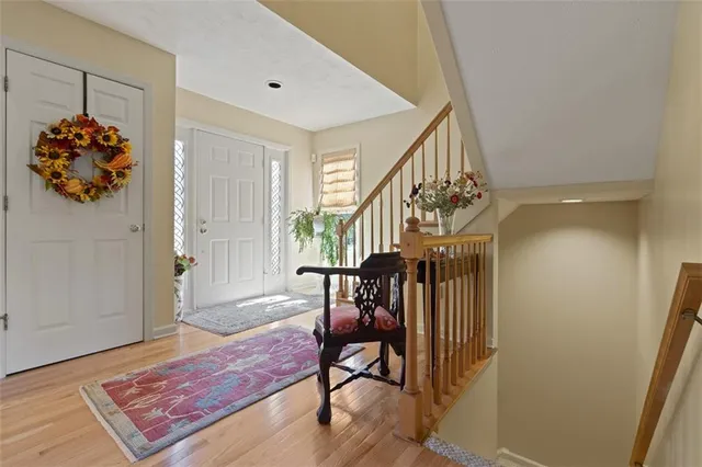 a living room with furniture and a rug