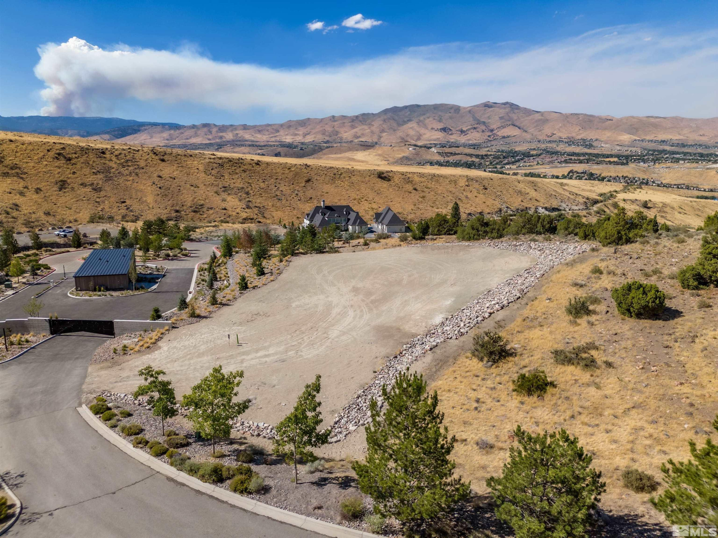 4760 Woodchuck Circle, Unit 1 Reno, NV 89519 - Photo 6 of 11 a view of a lake with a mountain