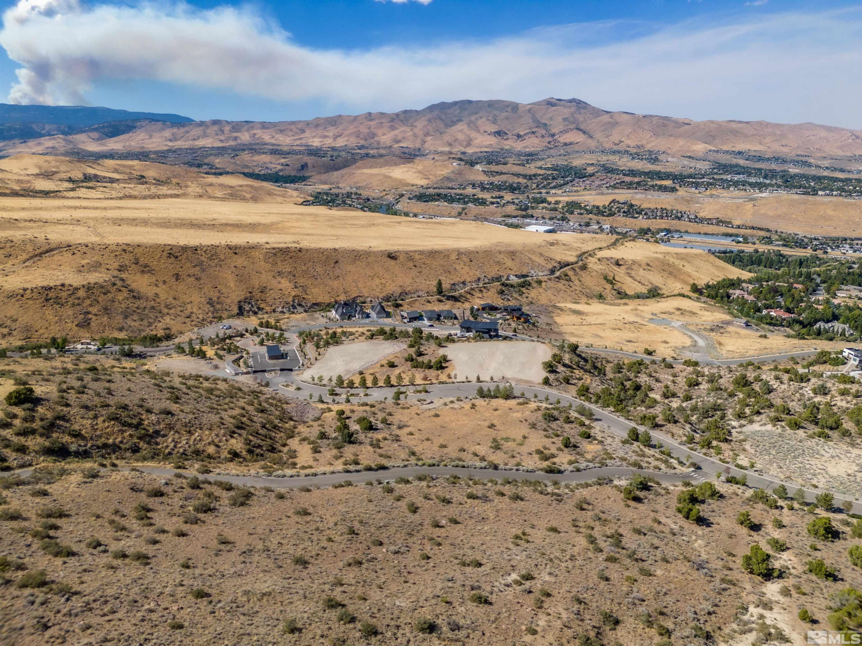 4760 Woodchuck Circle, Unit 1 Reno, NV 89519 - Photo 9 of 11 a view of ocean and mountain