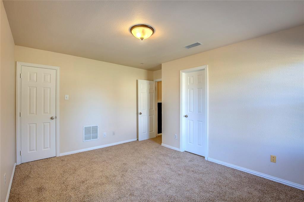 1157 Zajic Drive Terrell, TX 75160 - Photo 27 of 39 Unfurnished bedroom with carpet flooring and baseboards