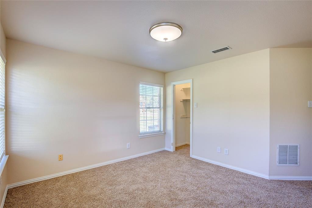 1157 Zajic Drive Terrell, TX 75160 - Photo 35 of 39 Carpeted spare room featuring baseboards