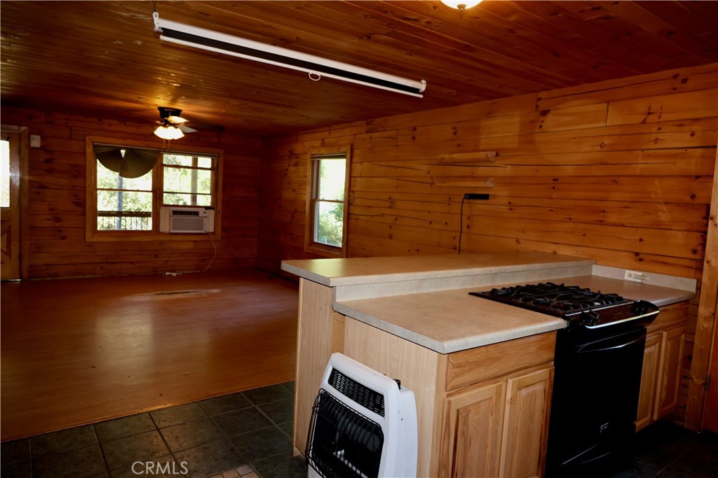 37023 Alder Drive Yucaipa, CA 92399 - Photo 12 of 34 a kitchen that has a sink and a stove
