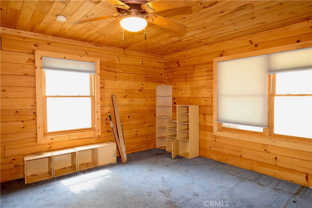 37023 Alder Drive Yucaipa, CA 92399 - Photo 15 of 34 a view of a room with air conditioner duct and windows