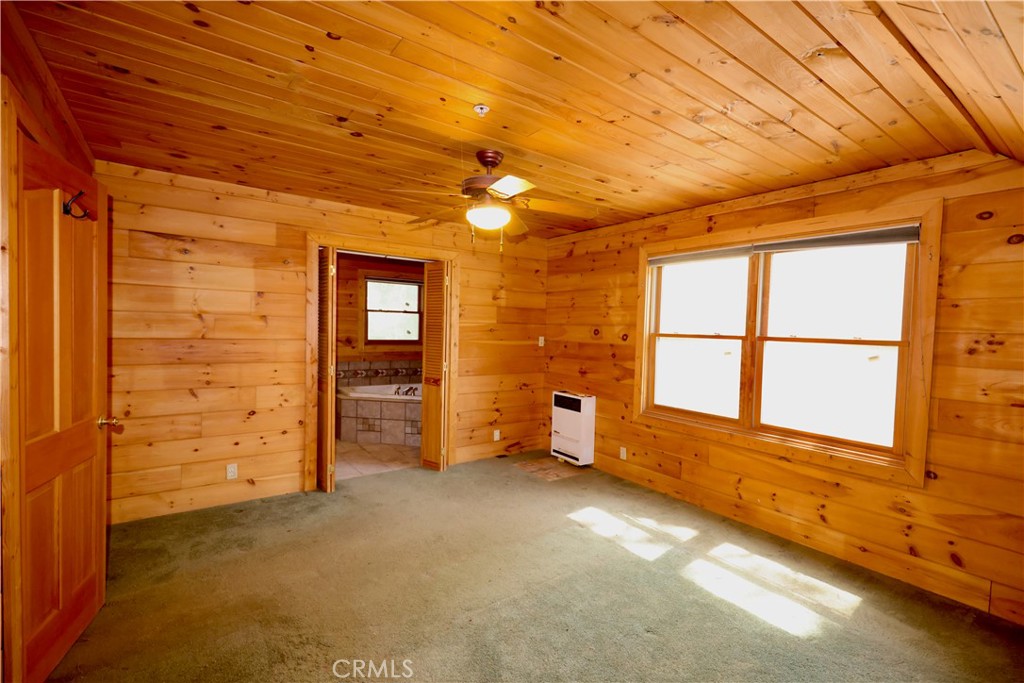 37023 Alder Drive Yucaipa, CA 92399 - Photo 21 of 34 an empty room with windows