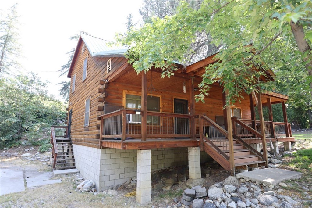 37023 Alder Drive Yucaipa, CA 92399 - Photo 28 of 34 a view of a house with a tree
