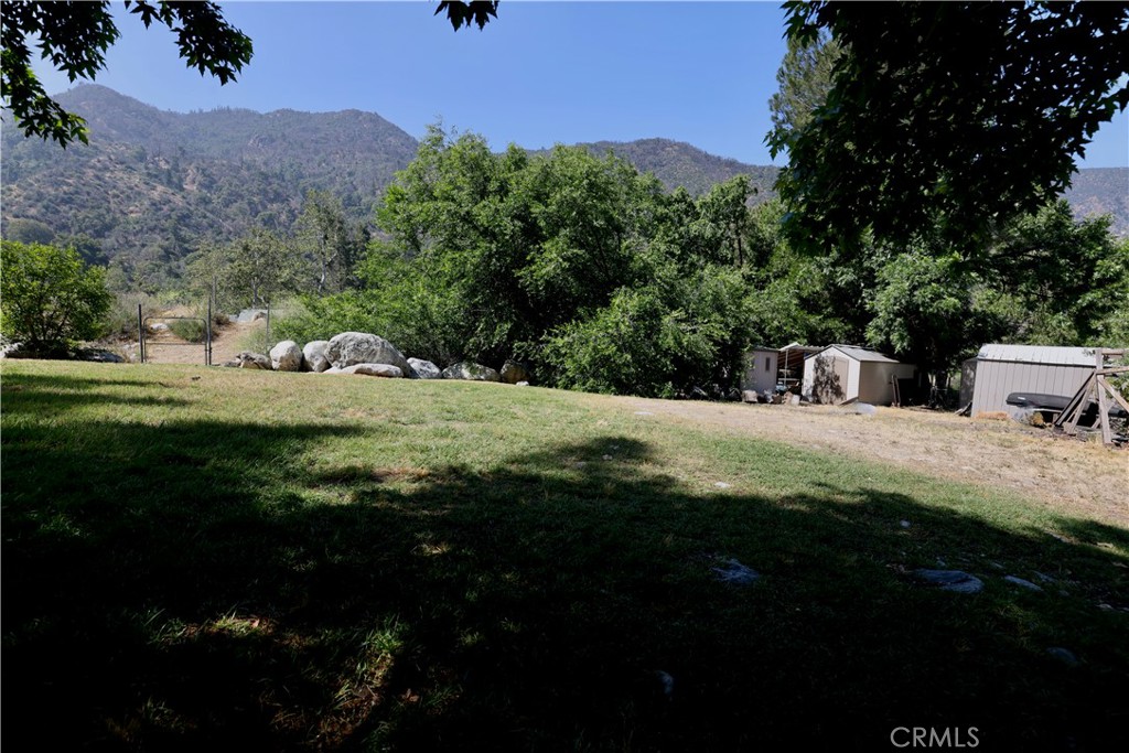37023 Alder Drive Yucaipa, CA 92399 - Photo 32 of 34 a view of a house with a yard