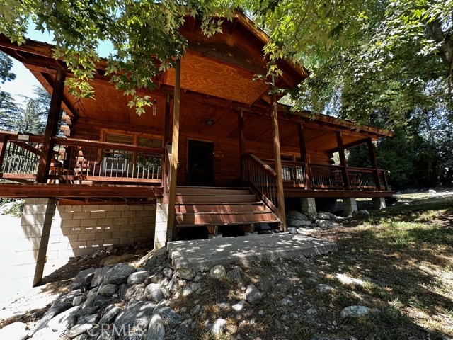37023 Alder Drive Yucaipa, CA 92399 - Photo 5 of 34 a view of a house with a yard