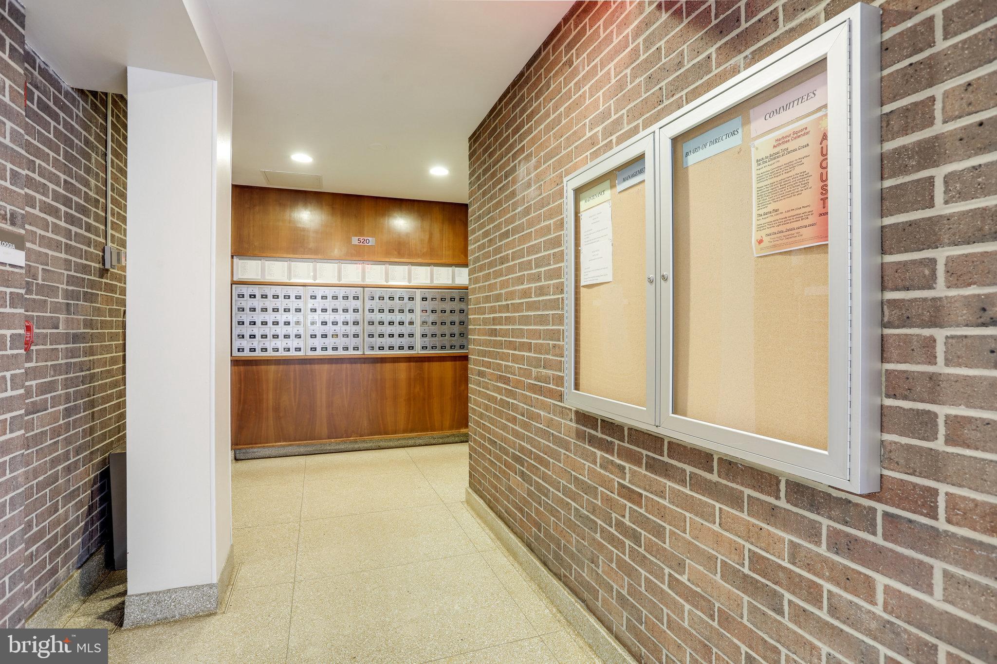 510 N Street Southwest, Unit N430 Washington, DC 20024 - Photo 18 of 29 a view of a hallway with a door and wooden floor